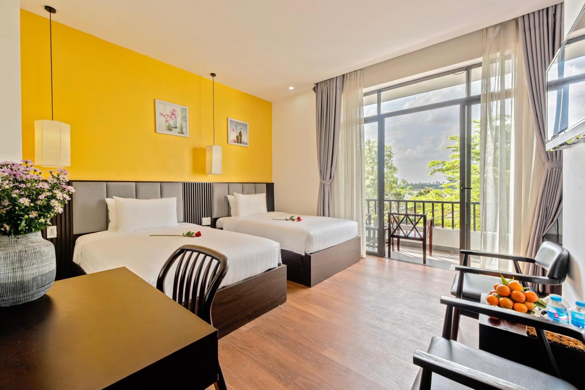 Serene Riverside Hotel Hội An Extérieur photo