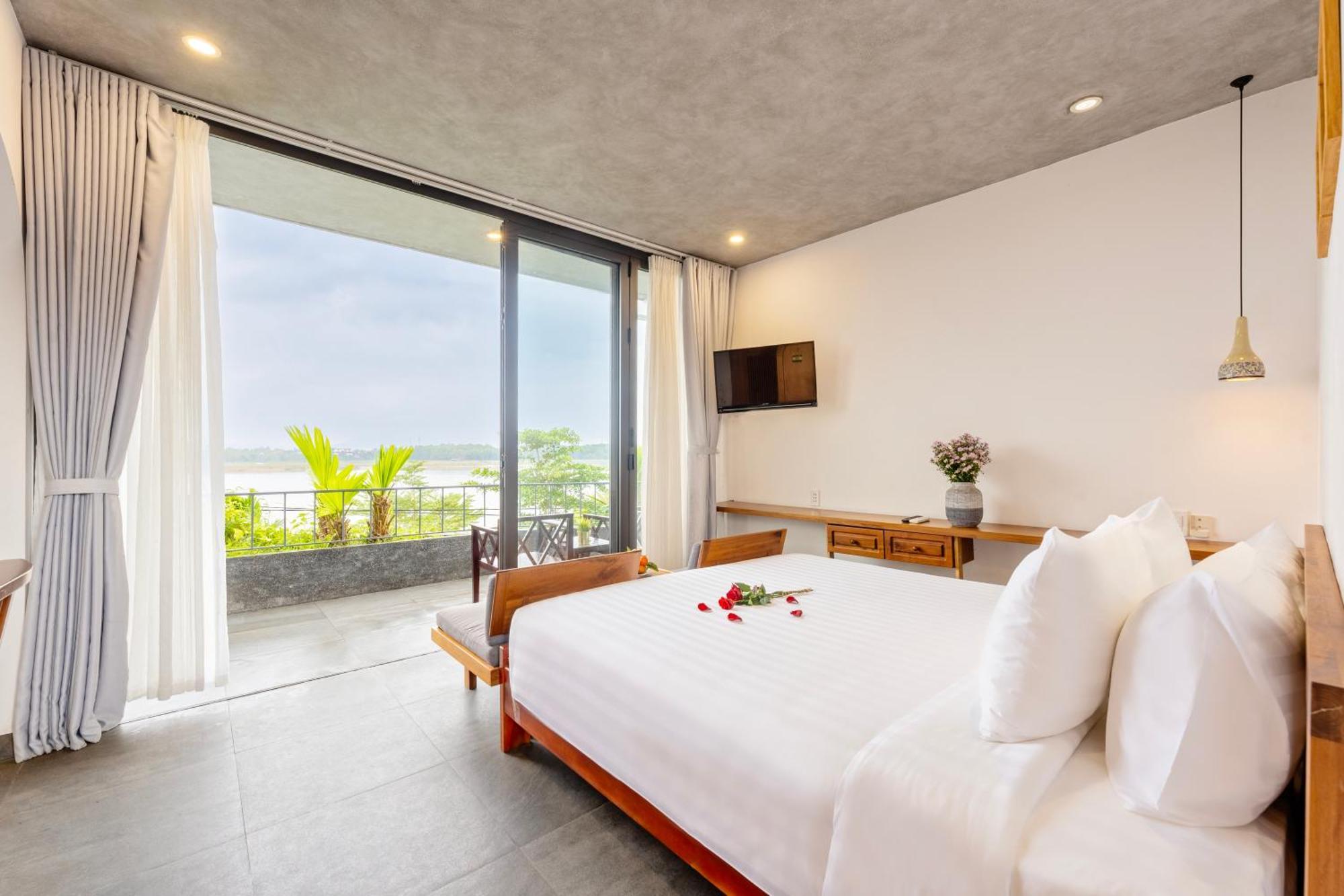 Serene Riverside Hotel Hội An Extérieur photo
