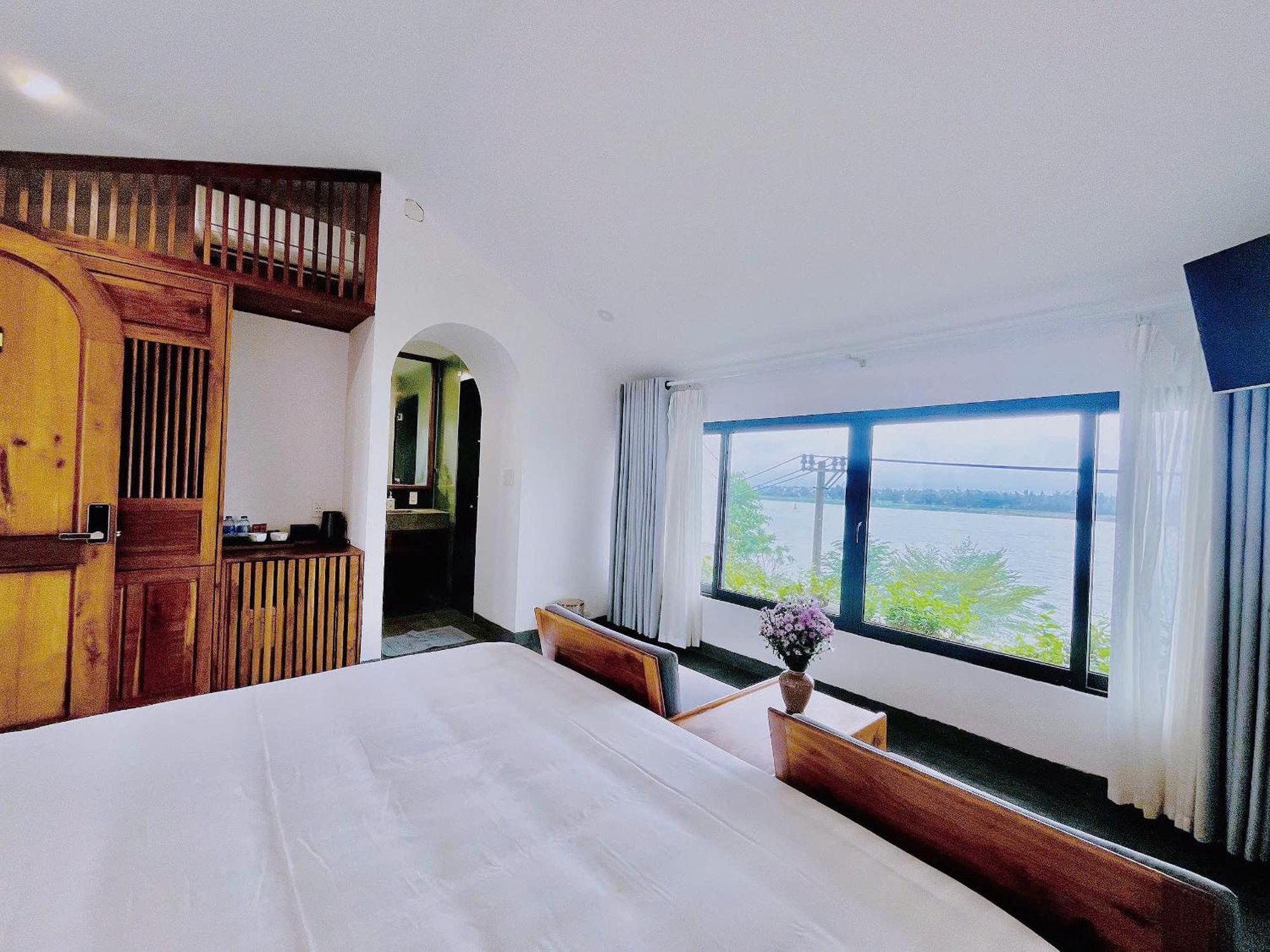 Serene Riverside Hotel Hội An Extérieur photo